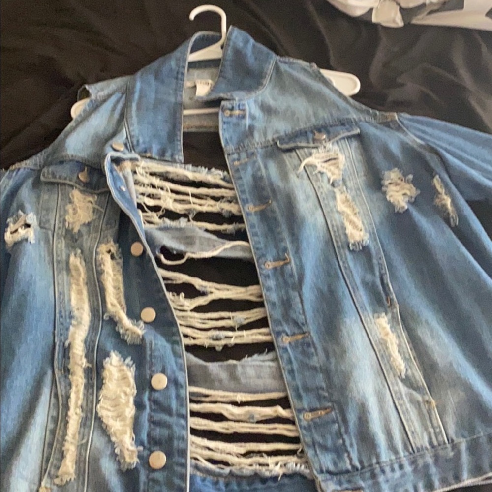 Gently wore distressed jean jacket